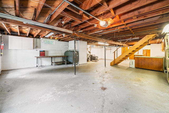765 Kettletown Rd, Southbury, CT 06488 - basement featuring oil tank, stairway, and concrete block wall