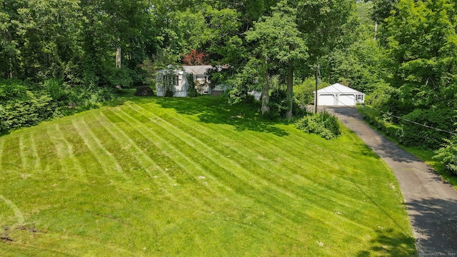 765 Kettletown Rd, Southbury, CT 06488 - view of green lawn featuring an outbuilding and a garage
