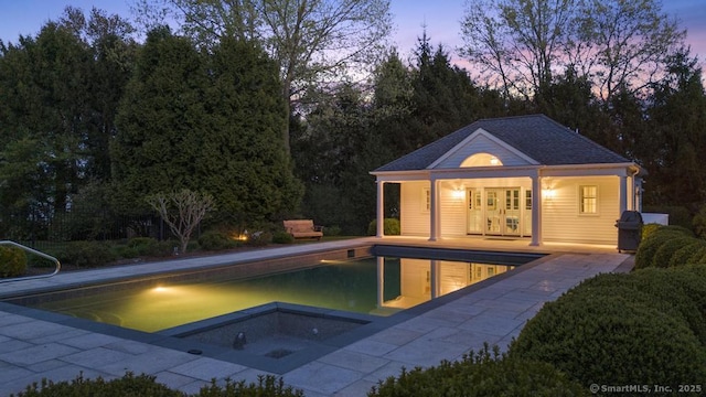 21 Queens Grant Dr, Fairfield, CT 06824 - outdoor pool featuring a storage structure, an in-ground hot tub, a patio area, and an outbuilding