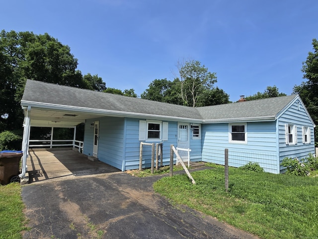 250 W Pond Road Ext, North Branford, CT 06471 - ranch-style home with asphalt driveway, an attached carport, and roof with shingles