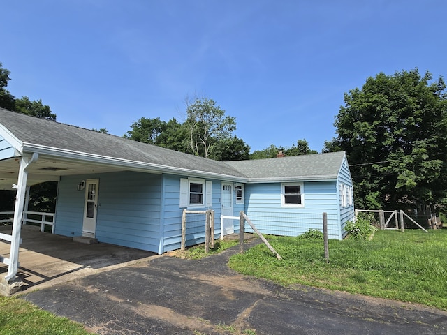 250 W Pond Road Ext, North Branford, CT 06471 - ranch-style home featuring an attached carport, a shingled roof, and a chimney
