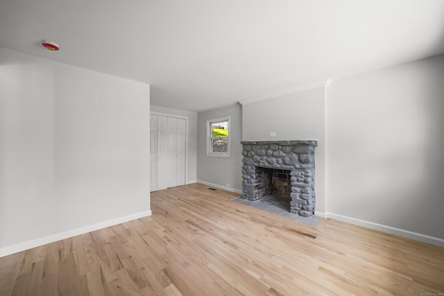 440 Lakeview Dr, Suffield, CT 06093 - unfurnished living room with wood finished floors and a fireplace