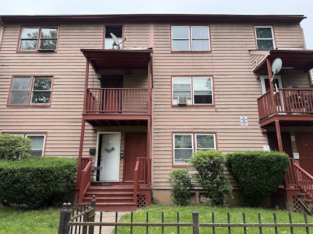 122 Clark St Unit B, Hartford, CT 06120 - view of front of house with a fenced front yard and a balcony