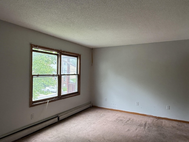 122 Clark St Unit B, Hartford, CT 06120 - spare room featuring a baseboard heating unit, carpet flooring, and a textured ceiling