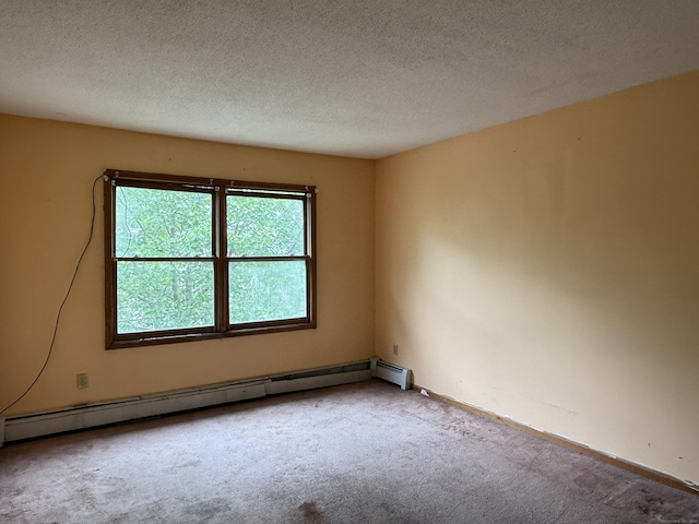 122 Clark St Unit B, Hartford, CT 06120 - empty room with a baseboard heating unit, carpet, and a textured ceiling