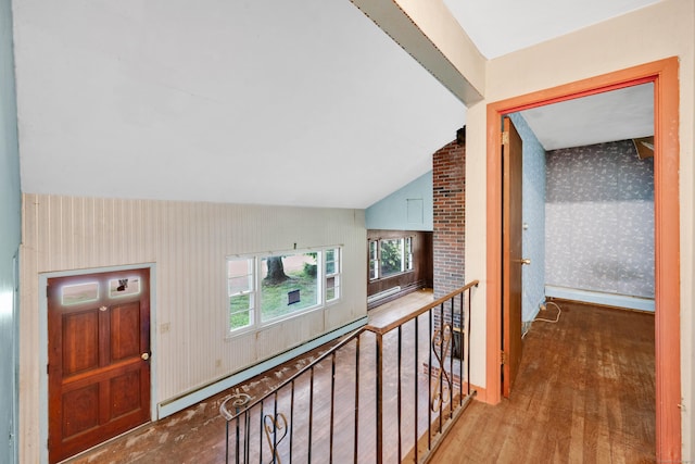 134 Sunset St, Windsor Locks, CT 06096 - corridor with wallpapered walls, wood finished floors, and vaulted ceiling