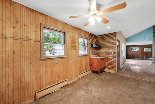 134 Sunset St, Windsor Locks, CT 06096 - unfurnished living room with a baseboard radiator, wooden walls, ceiling fan, vaulted ceiling, and a wall mounted AC