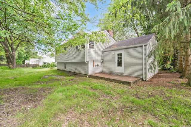 134 Sunset St, Windsor Locks, CT 06096 - rear view of property featuring a chimney and a yard