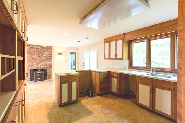 22 Trumbull Rd, Waterford, CT 06385 - kitchen featuring a peninsula, plenty of natural light, light countertops, light stone finish floors, and recessed lighting