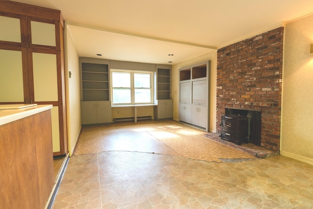 22 Trumbull Rd, Waterford, CT 06385 - unfurnished living room featuring stone finish floors, baseboard heating, and a wood stove