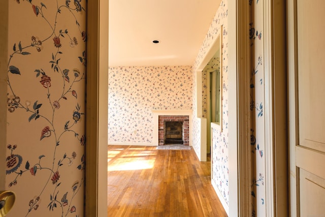 22 Trumbull Rd, Waterford, CT 06385 - hall with light wood-style flooring and wallpapered walls