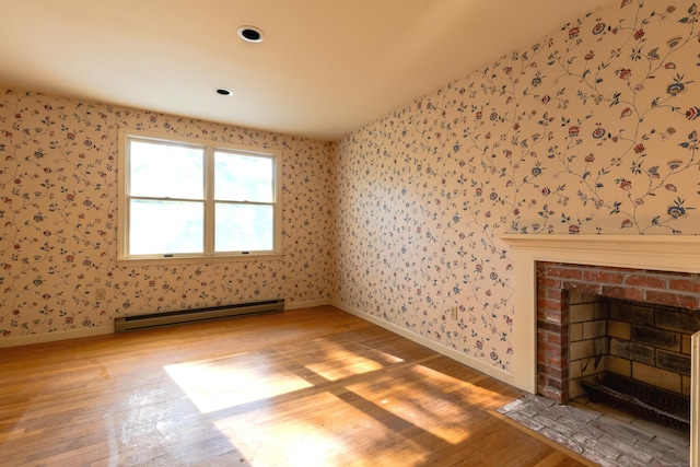 22 Trumbull Rd, Waterford, CT 06385 - unfurnished living room with a baseboard radiator, wood finished floors, wallpapered walls, a brick fireplace, and recessed lighting