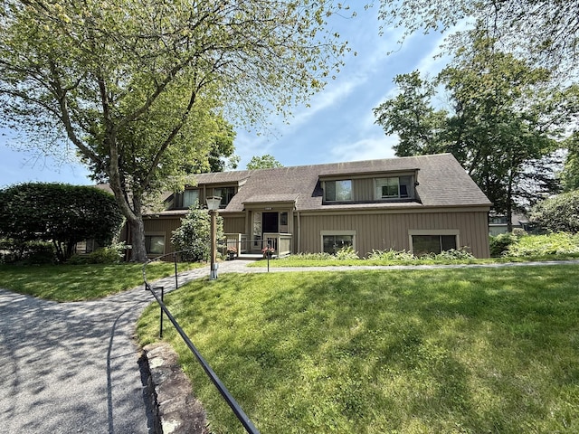 32 Heritage Vlg Unit C, Southbury, CT 06488 - view of front of house with a front yard and roof with shingles