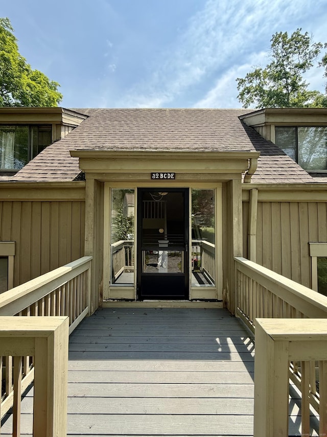 32 Heritage Vlg Unit C, Southbury, CT 06488 - entrance to property featuring roof with shingles and a wooden deck