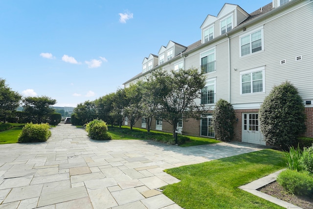 142 E Ave Unit A106, Norwalk, CT 06851 - surrounding community with a lawn