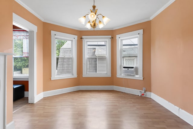 29 Bristol St, West Haven, CT 06516 - unfurnished dining area featuring a chandelier, light wood-type flooring, crown molding, and cooling unit