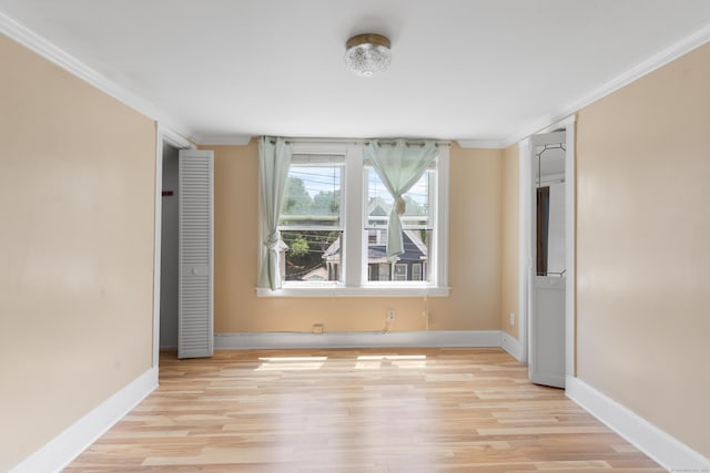 29 Bristol St, West Haven, CT 06516 - spare room with crown molding and light wood-style flooring