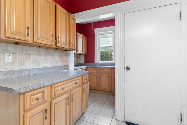29 Bristol St, West Haven, CT 06516 - kitchen with backsplash, light tile patterned floors, and light countertops