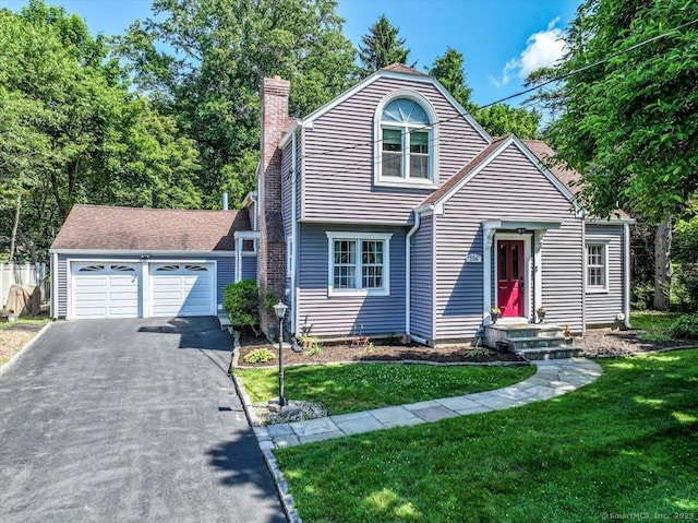 156 Killian Ave, Trumbull, CT 06611 - view of front of property featuring a chimney, asphalt driveway, a front yard, and an attached garage