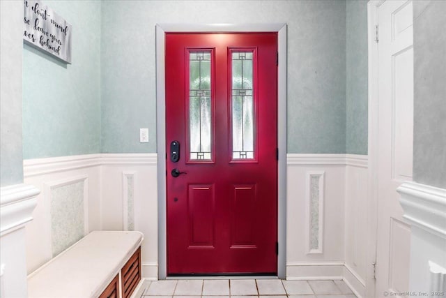 156 Killian Ave, Trumbull, CT 06611 - foyer entrance featuring a decorative wall, wainscoting, and light tile patterned floors