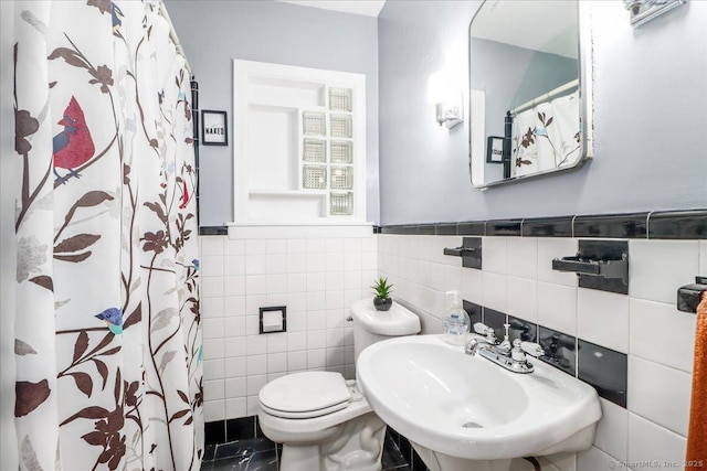 156 Killian Ave, Trumbull, CT 06611 - full bathroom with curtained shower, tile walls, and a wainscoted wall