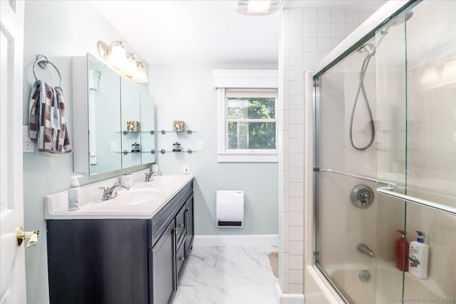 156 Killian Ave, Trumbull, CT 06611 - bathroom featuring double vanity, marble finish flooring, and combined bath / shower with glass door
