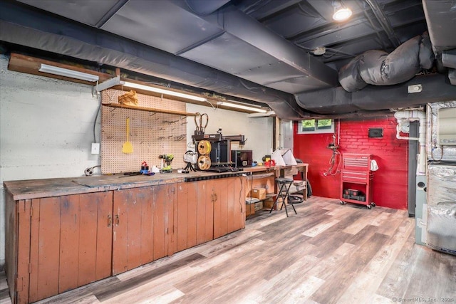 156 Killian Ave, Trumbull, CT 06611 - basement with a workshop area and light wood-type flooring