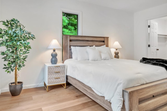 916 N Farms Rd, Wallingford, CT 06492 - bedroom featuring wood finished floors and baseboards
