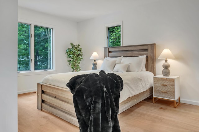 916 N Farms Rd, Wallingford, CT 06492 - bedroom featuring light wood-style flooring and baseboards