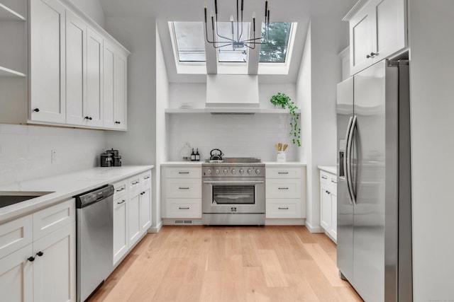 916 N Farms Rd, Wallingford, CT 06492 - kitchen with open shelves, stainless steel appliances, backsplash, and light wood finished floors