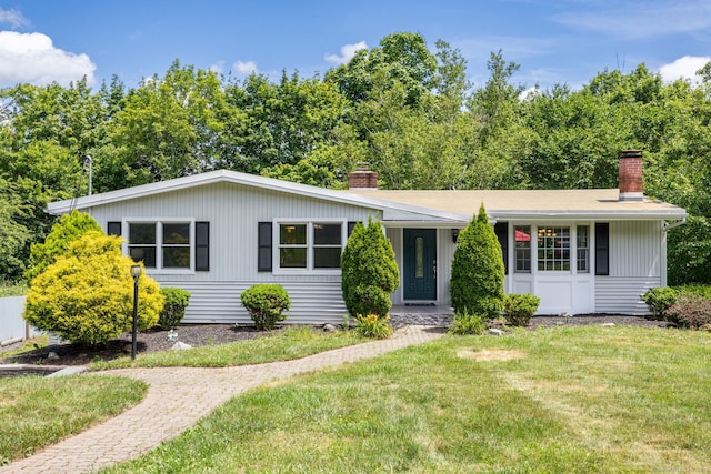 33 Terrace Rd, West Hartford, CT 06107 - single story home with a chimney and a front yard
