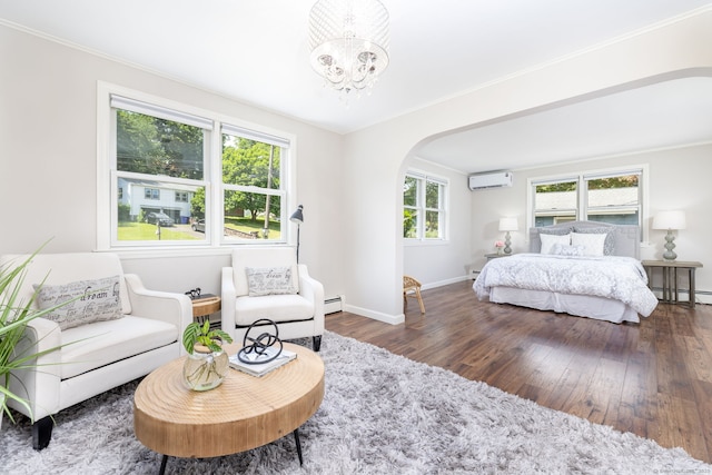 33 Terrace Rd, West Hartford, CT 06107 - bedroom with a wall mounted AC, arched walkways, hardwood / wood-style floors, a baseboard radiator, and ornamental molding