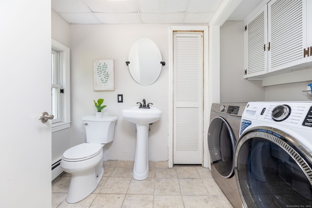 33 Terrace Rd, West Hartford, CT 06107 - laundry area with washer and clothes dryer and baseboard heating