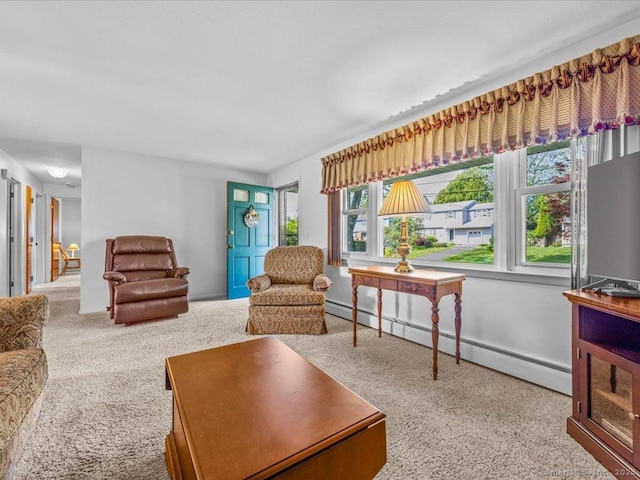 55 Oxbow Dr, Meriden, CT 06450 - carpeted living area featuring a baseboard heating unit