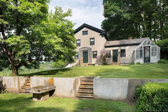 163 Dublin Rd, Canaan, CT 06031 - back of house with entry steps, stairway, a yard, and stucco siding