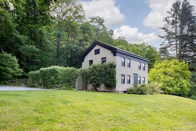 163 Dublin Rd, Canaan, CT 06031 - view of home's exterior with a yard and stucco siding
