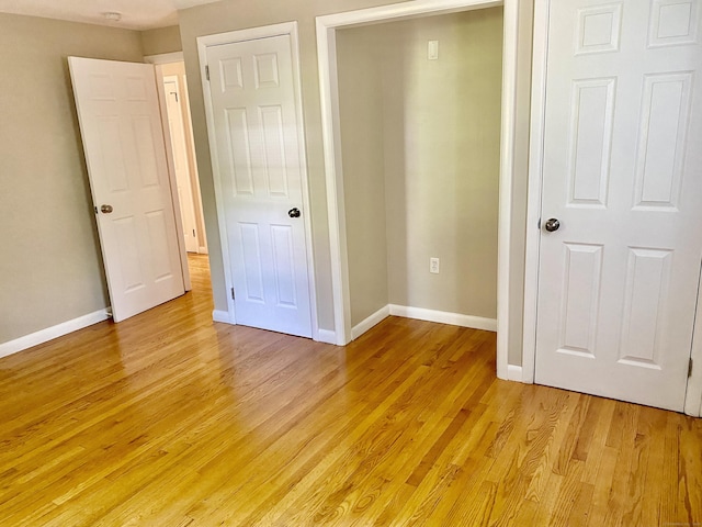 80 Murlyn Rd, Hamden, CT 06518 - unfurnished bedroom with light wood finished floors and baseboards