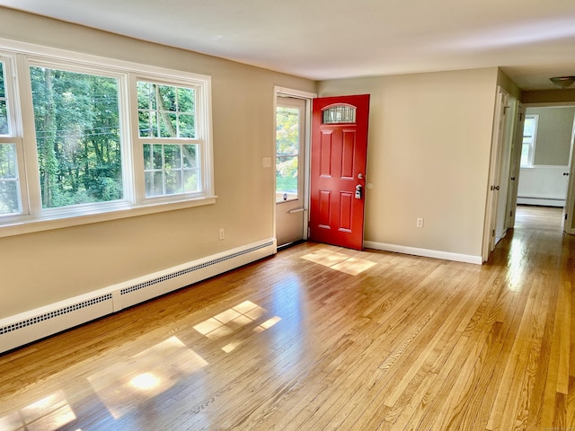 80 Murlyn Rd, Hamden, CT 06518 - entrance foyer featuring baseboard heating and light wood-style flooring