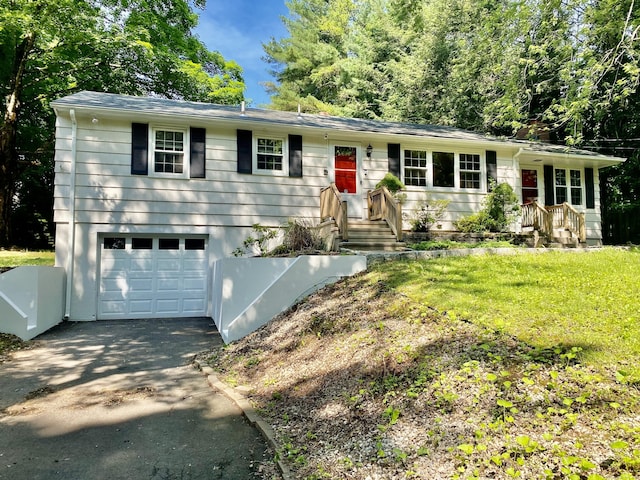 80 Murlyn Rd, Hamden, CT 06518 - single story home with an attached garage, driveway, and a front yard