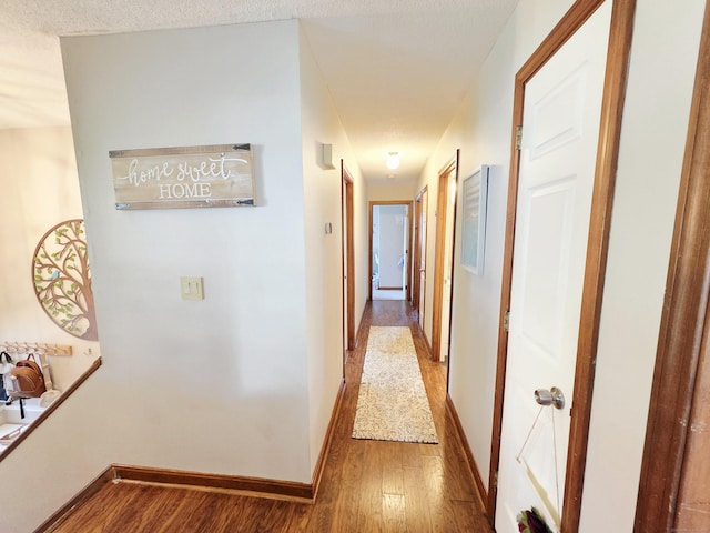 23 Teach St, Enfield, CT 06082 - hallway featuring wood finished floors and baseboards