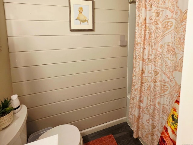 23 Teach St, Enfield, CT 06082 - bathroom with shower / bath combo and wood finished floors