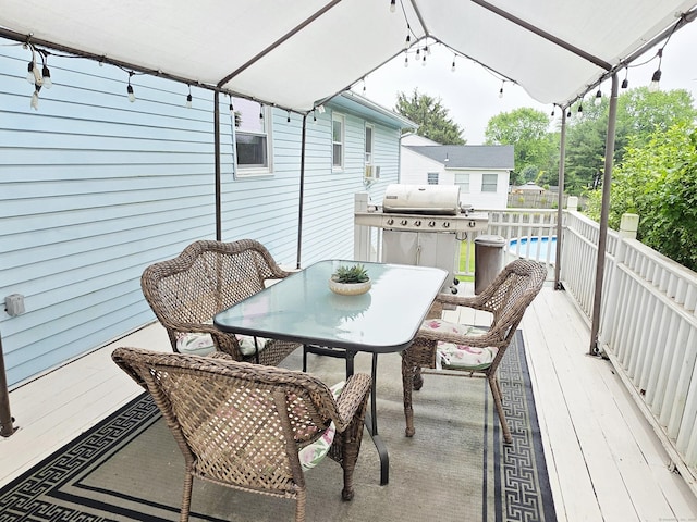 23 Teach St, Enfield, CT 06082 - view of patio / terrace featuring grilling area, outdoor dining space, and a wooden deck