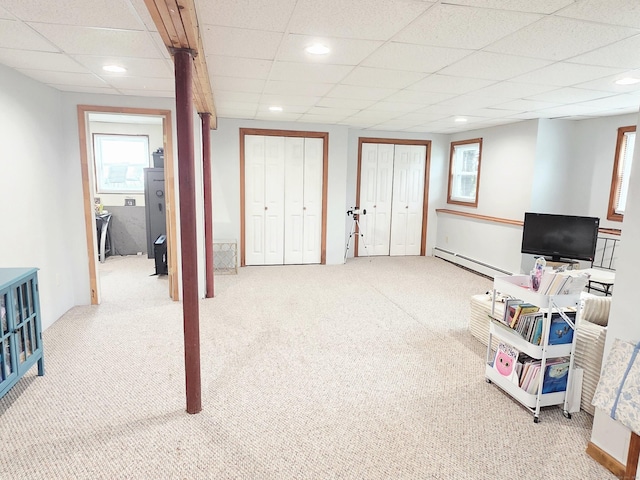 23 Teach St, Enfield, CT 06082 - rec room with carpet floors, a drop ceiling, a baseboard heating unit, and recessed lighting