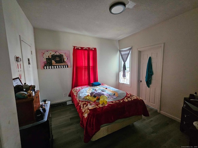 763 Park St, Hartford, CT 06106 - bedroom featuring wood finished floors and a textured ceiling