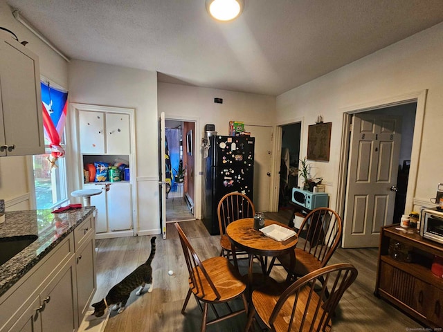 763 Park St, Hartford, CT 06106 - dining room featuring dark wood-style floors