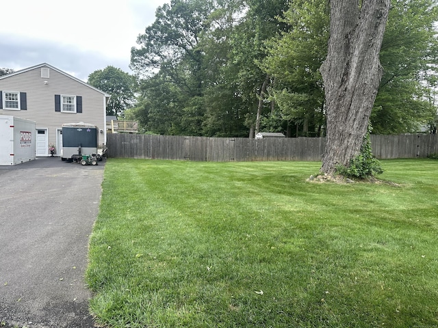 305 Rambler St, Bristol, CT 06010 - view of yard with asphalt driveway and a garage