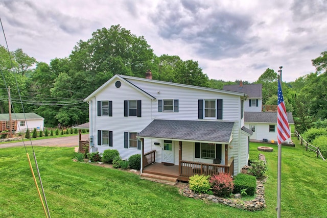 136 Reynolds Bridge Rd, Thomaston, CT 06787 - traditional home featuring a porch, a front lawn, a shingled roof, a chimney, and view of wooded area