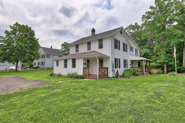 136 Reynolds Bridge Rd, Thomaston, CT 06787 - view of front of home featuring a porch, a chimney, and a front lawn