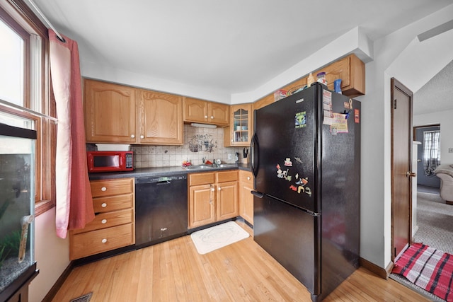 136 Reynolds Bridge Rd, Thomaston, CT 06787 - kitchen featuring black appliances, light wood finished floors, decorative backsplash, and dark countertops