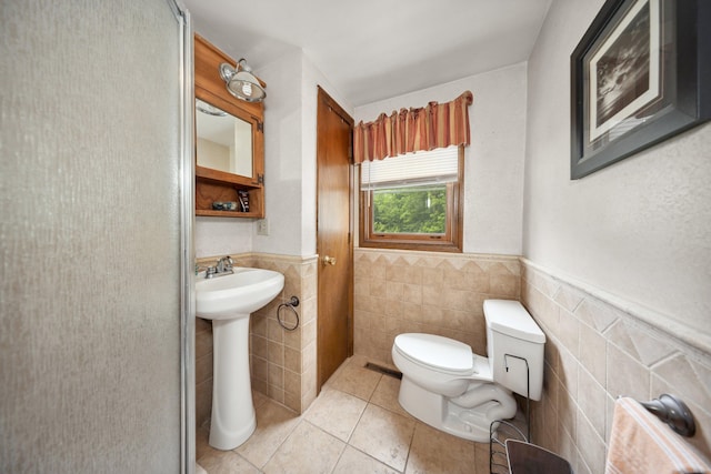 136 Reynolds Bridge Rd, Thomaston, CT 06787 - bathroom featuring tile walls, a wainscoted wall, and tile patterned floors